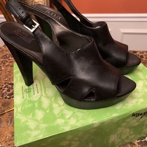 a.n.a. Black leather open toe platform sling back heels.